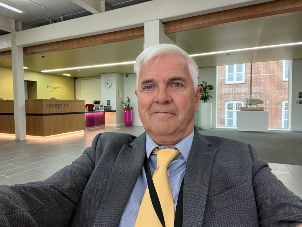 Politician in suit and tie at Hampshire County Council reception