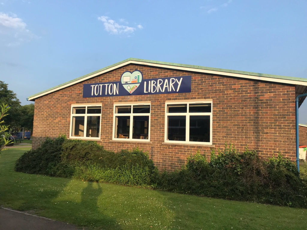 Totton Library building exterior with "Totton Library" signage.