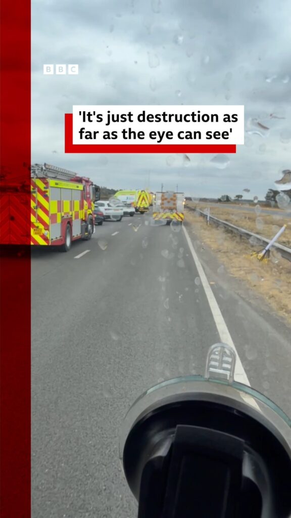 It's just destruction as far as the eye can see" text over A31 crash scene with fire engine.