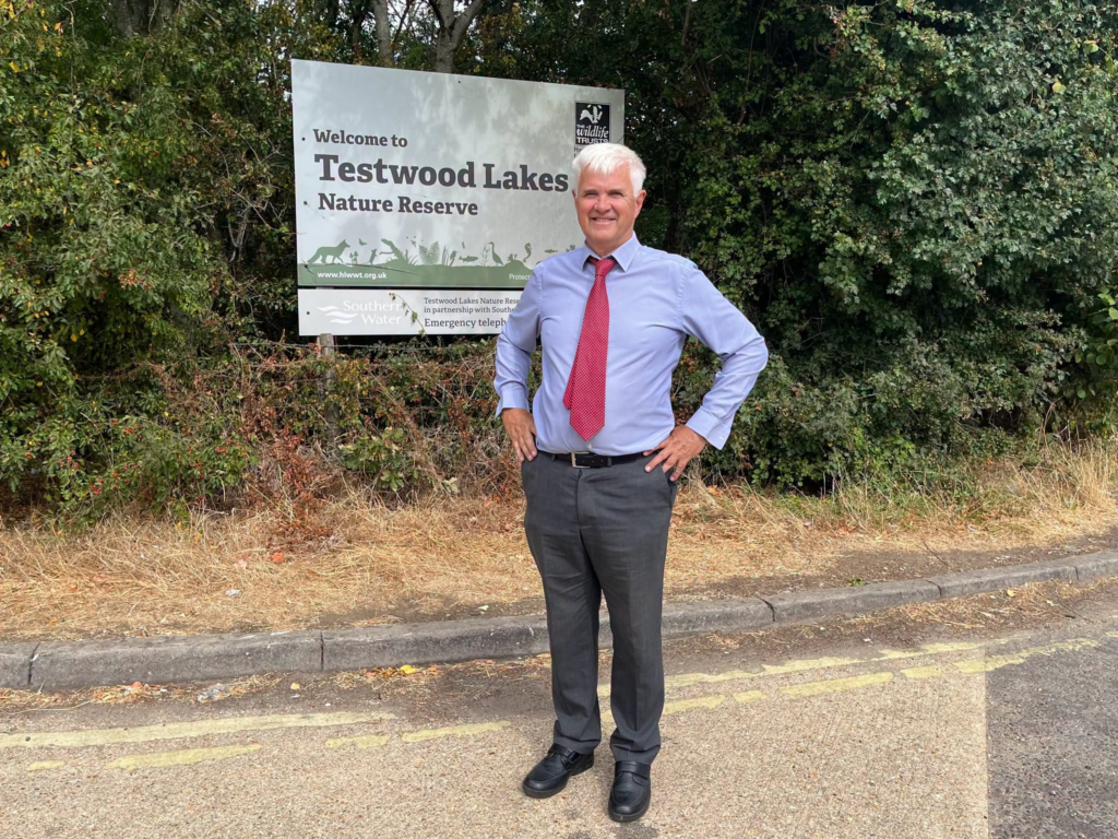 Testwood Lakes Nature Reserve sign with man in suit