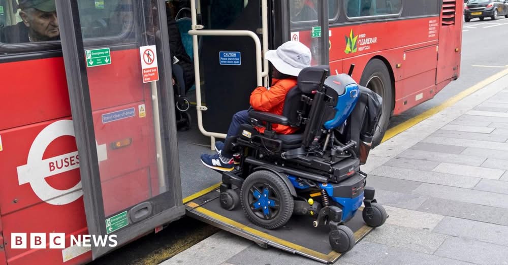 Disabled child in wheelchair boarding a London bus using ramp, a huge win.