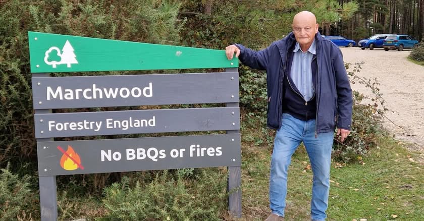 Man by Marchwood Forestry England sign, no BBQs or fires